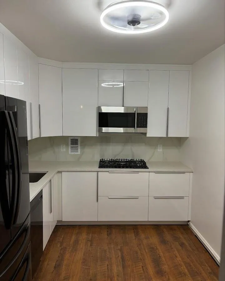 Renovated kitchen with quartz countertops in Bemiss
